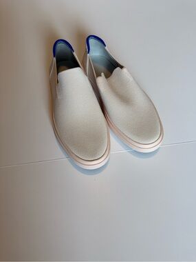 Rothy's Pale Pink Slip-On Sneakers with Blue Heel Tab - Never Worn